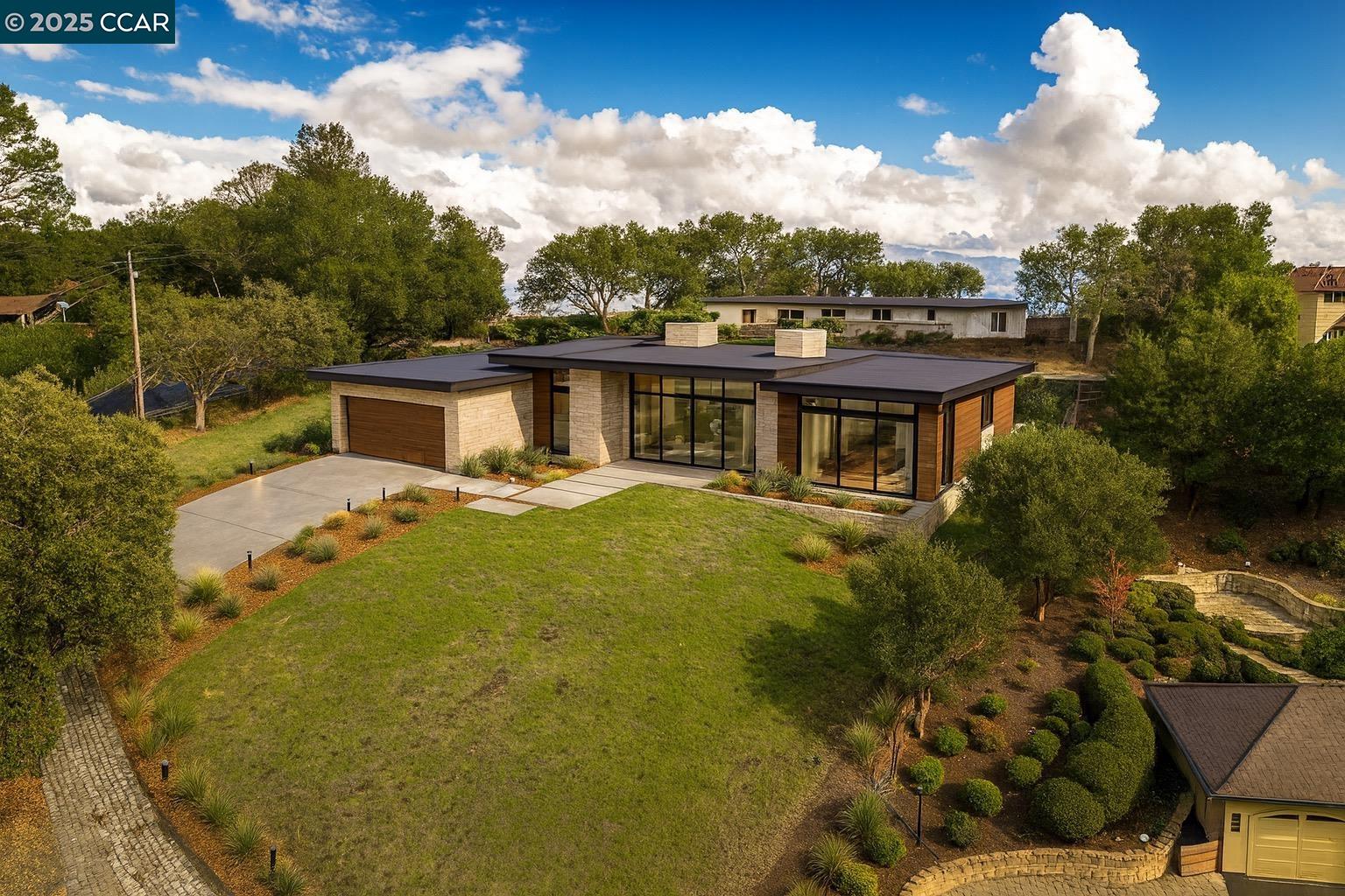 8 Gable Lane Lafayette, CA 94549 - Photo 2 of 10 a view of a house with a yard