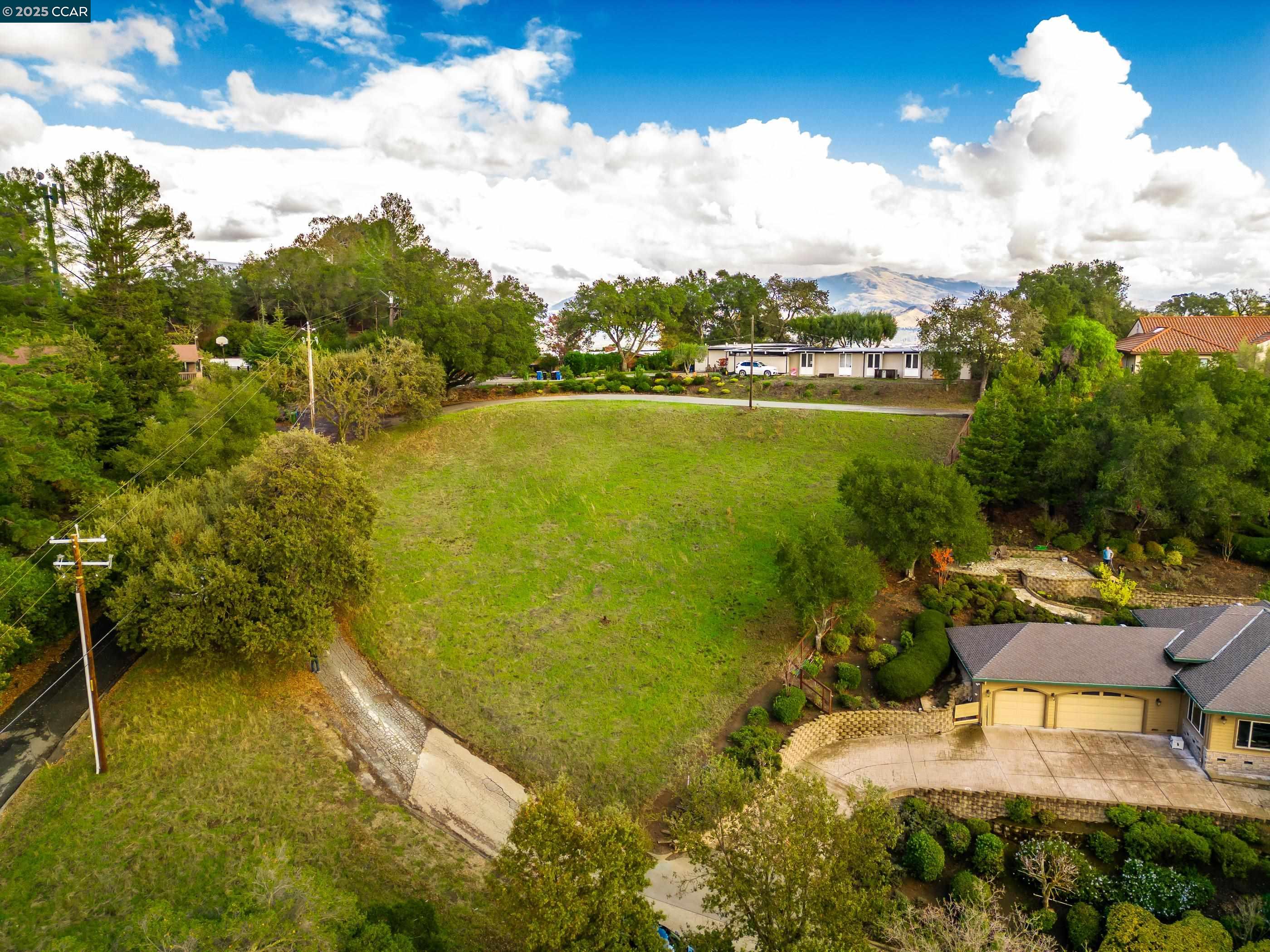 8 Gable Lane Lafayette, CA 94549 - Photo 4 of 10 a view of a lake with a mountain