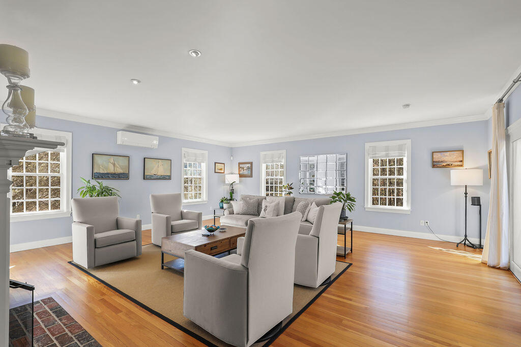 5 Fairfield Drive East Sandwich, MA 02537 - Photo 11 of 72 a living room with furniture and a wooden floor