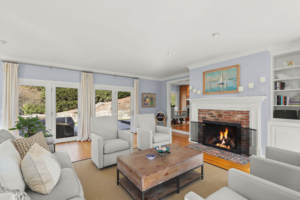 5 Fairfield Drive East Sandwich, MA 02537 - Photo 13 of 72 a living room with furniture and a fireplace