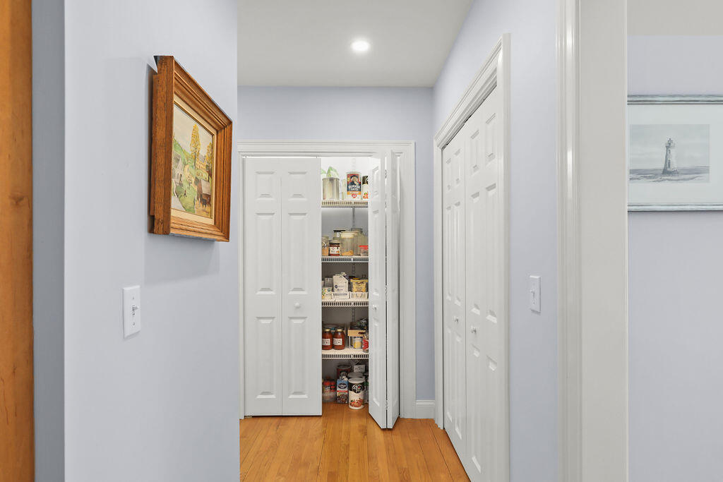 5 Fairfield Drive East Sandwich, MA 02537 - Photo 22 of 72 a view of a hallway with wooden floor and closet