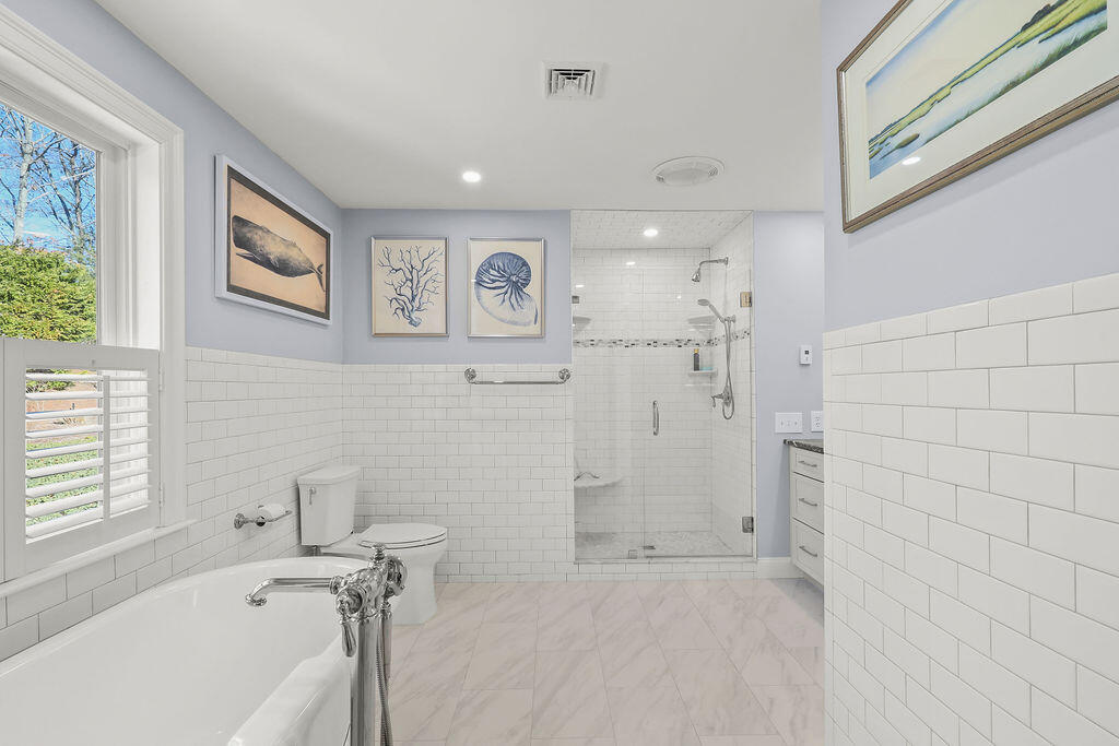 5 Fairfield Drive East Sandwich, MA 02537 - Photo 44 of 72 a bathroom with a tub and shower