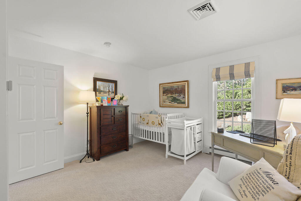 5 Fairfield Drive East Sandwich, MA 02537 - Photo 48 of 72 a living room with furniture and a flat screen tv