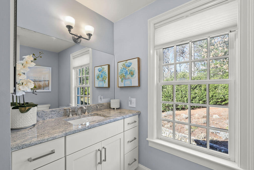 5 Fairfield Drive East Sandwich, MA 02537 - Photo 50 of 72 a bathroom with double vanity and a mirror