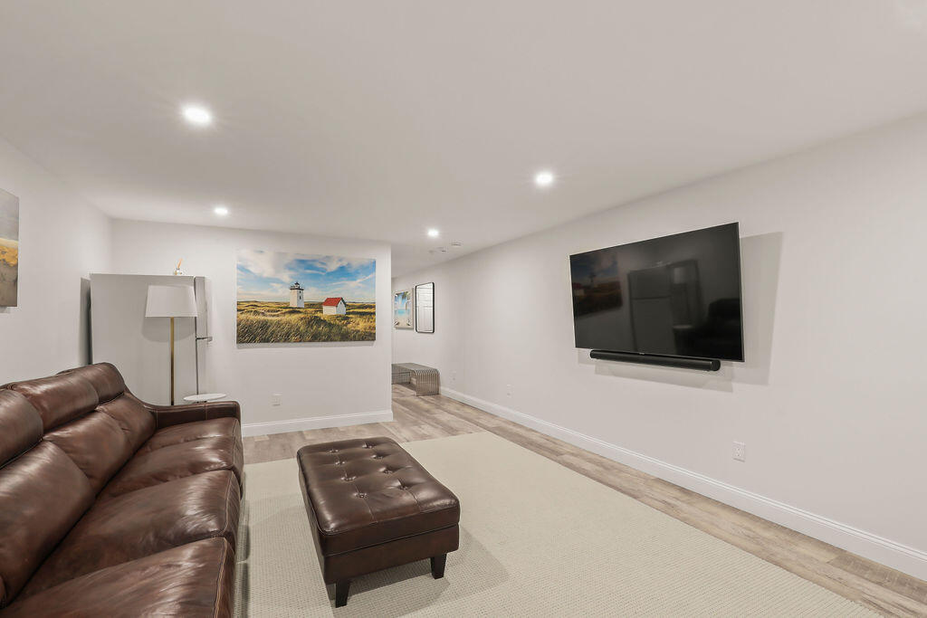 5 Fairfield Drive East Sandwich, MA 02537 - Photo 55 of 72 a living room with furniture and a flat screen tv