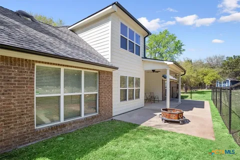 a house view with a garden space