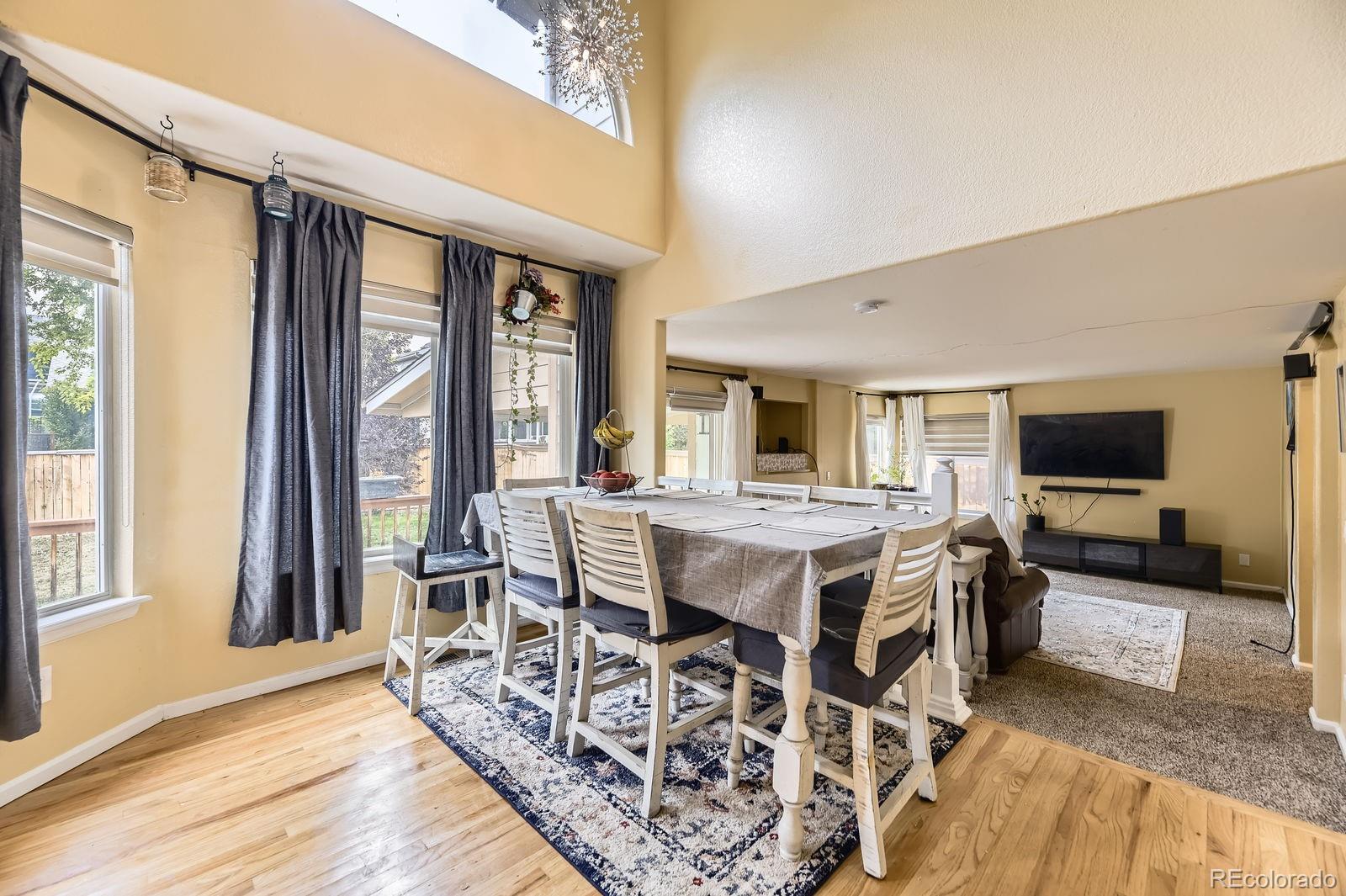 5329 Morning Glory Place Highlands Ranch, CO 80130 - Photo 11 of 28 a view of a livingroom with furniture and window