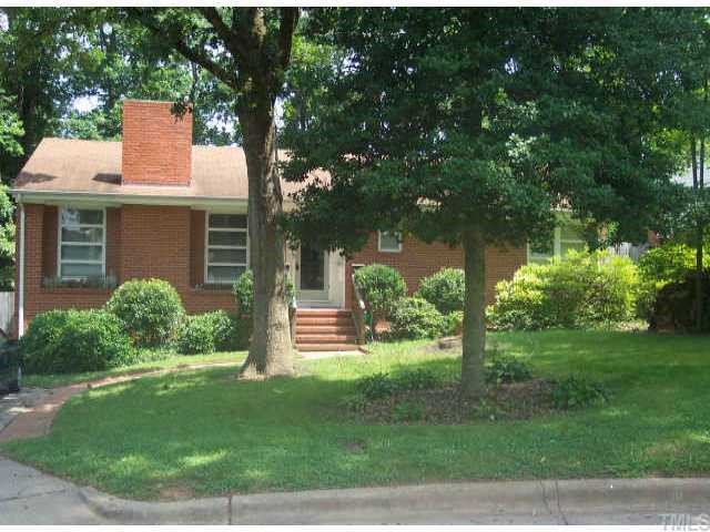 2918 Barmettler Street Raleigh, NC 27607 - Photo 1 of 1 a front view of a house with garden