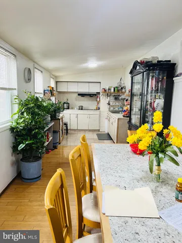 a kitchen with stainless steel appliances a cabinets and a counter top space