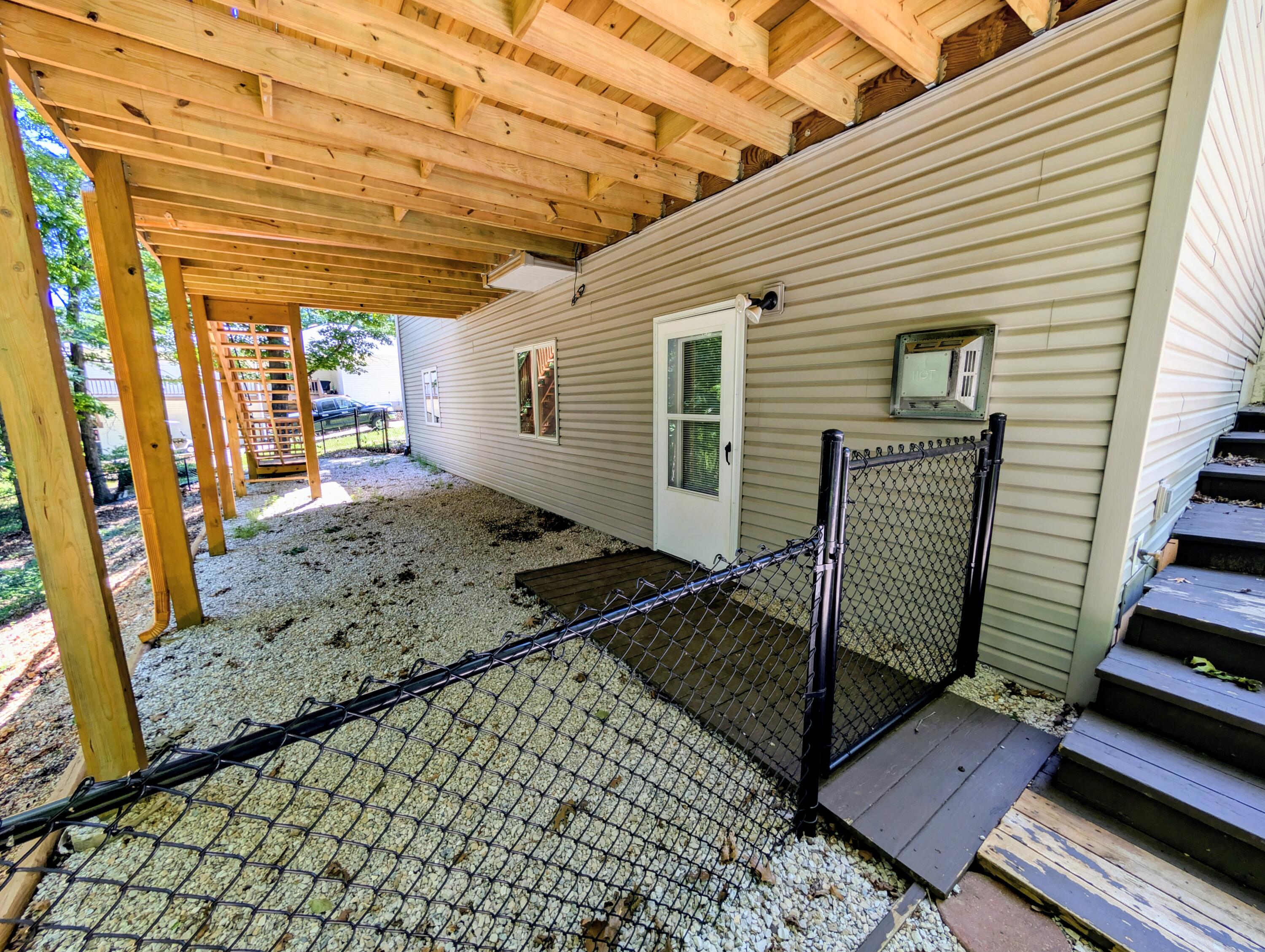 203 Queensberry Road Reeds Spring, MO 65737 - Photo 65 of 80 LL off family rm w/walkway way