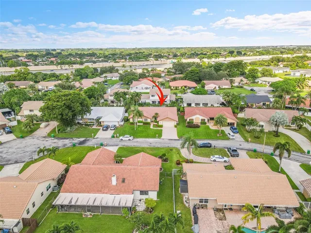 an aerial view of residential building with outdoor space