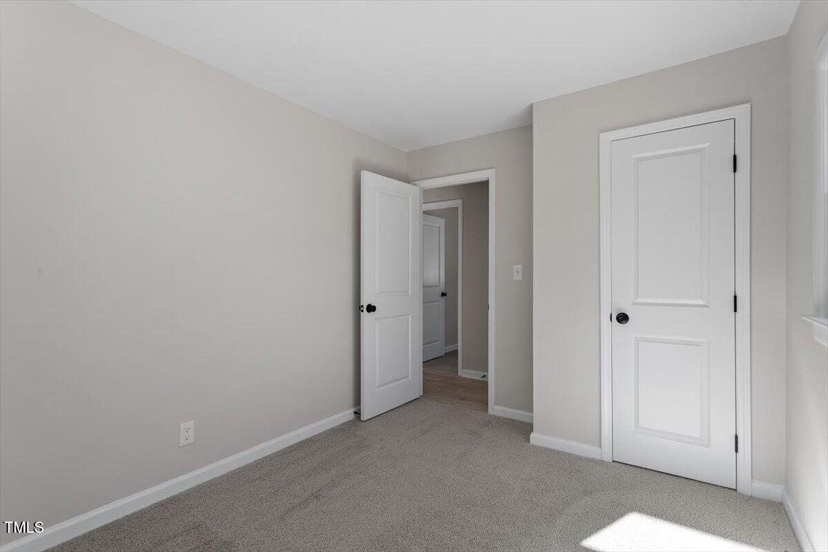 1404 Valley Road Garner, NC 27529 - Photo 18 of 29 a view of an empty room
