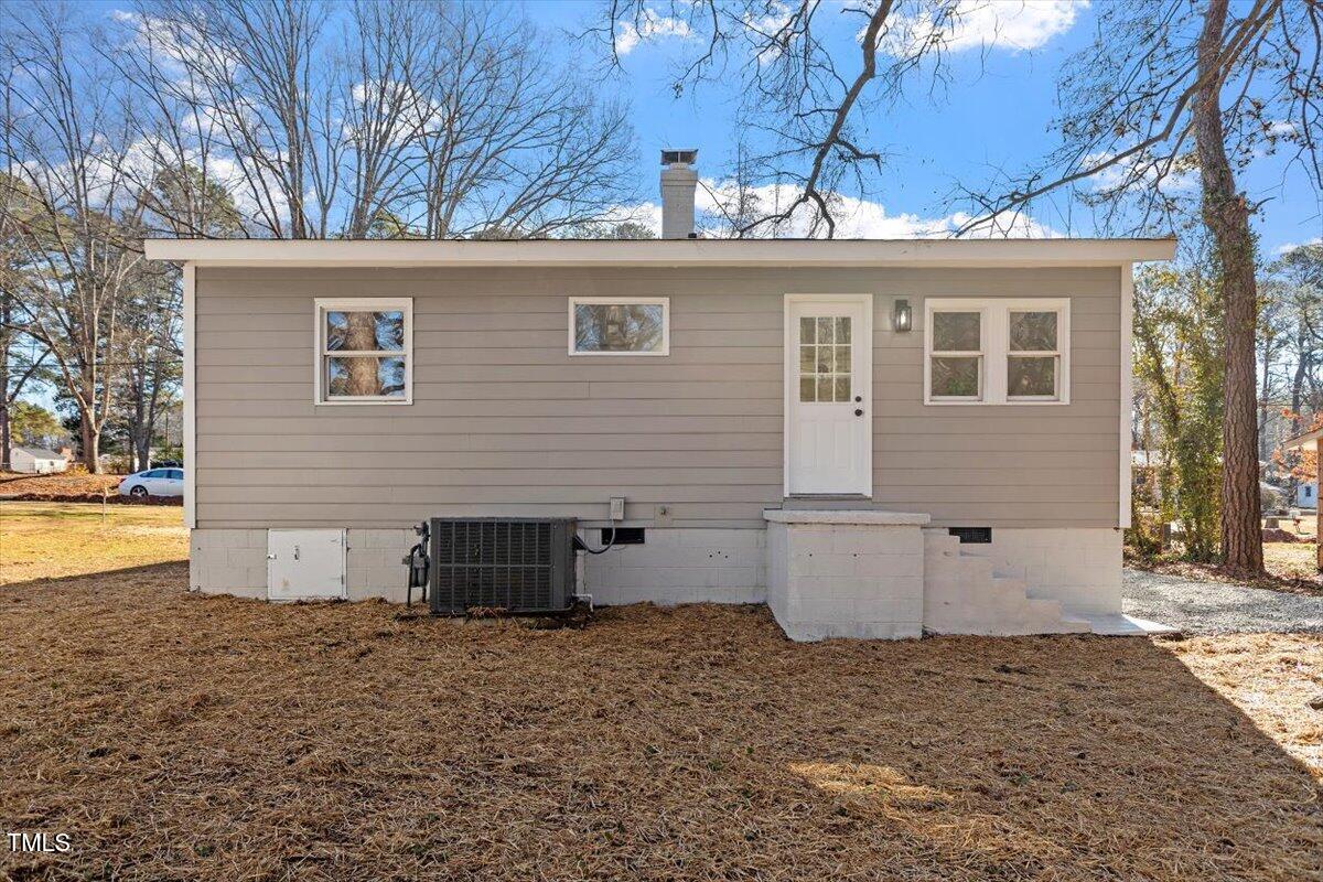 1404 Valley Road Garner, NC 27529 - Photo 25 of 29 a view of a house with backyard and space