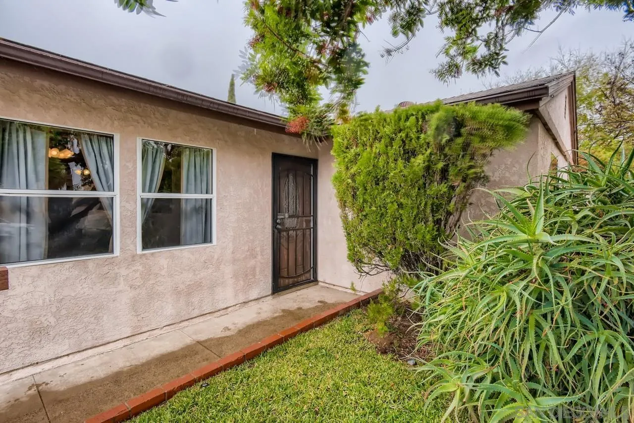 9572 Domer Road Santee, CA 92071 - Photo 3 of 28 front view of a house with a yard