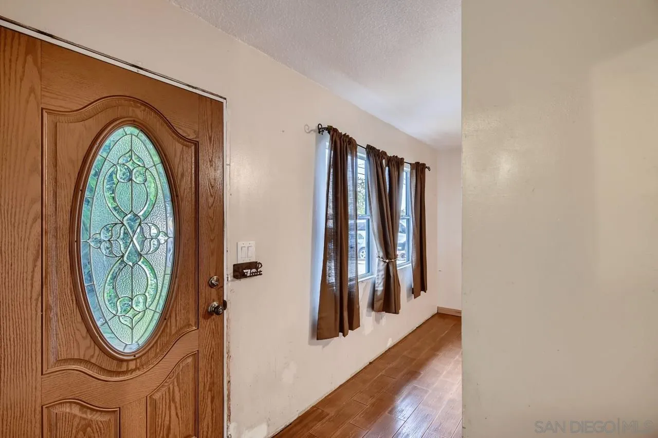 9572 Domer Road Santee, CA 92071 - Photo 4 of 28 a view of a entryway with washer and dryer