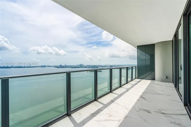 a view of balcony with furniture