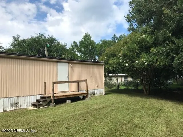 a picture of a bench in front of a window