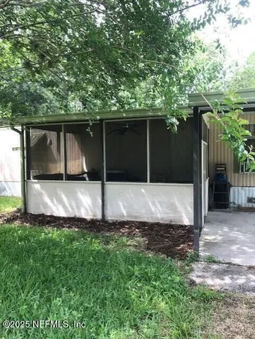 a house view with a outdoor space