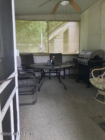 a view of a porch with a yard