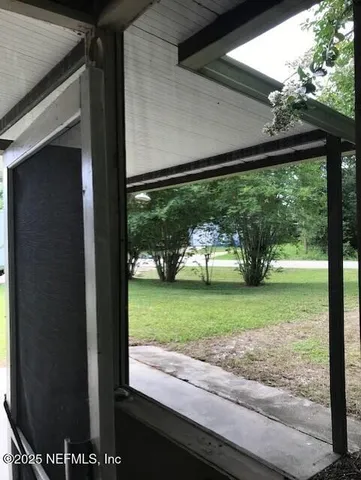 a room with furniture and window
