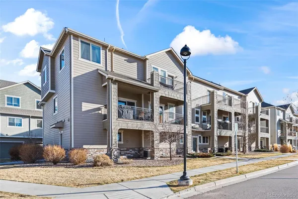 a front view of a building with street view