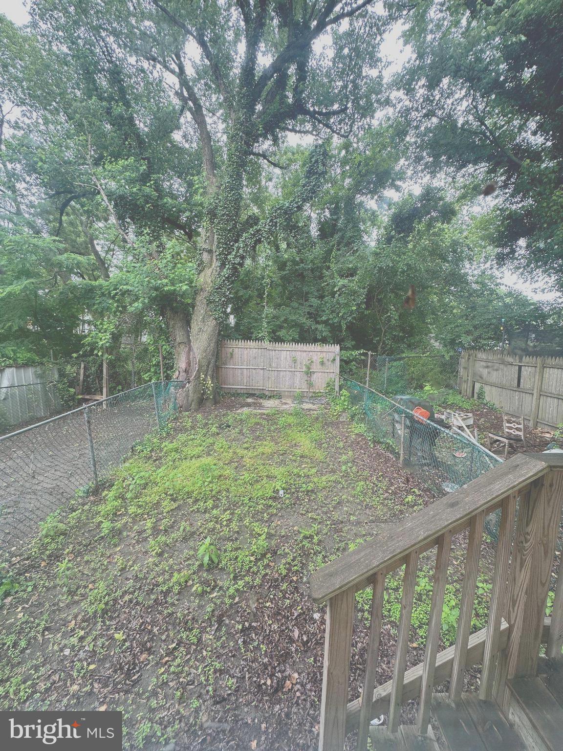 1109 Nottingham Way Hamilton, NJ 08609 - Photo 17 of 17 a backyard of a house with lots of green space