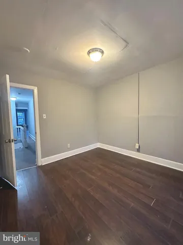 a view of a livingroom with wooden floor