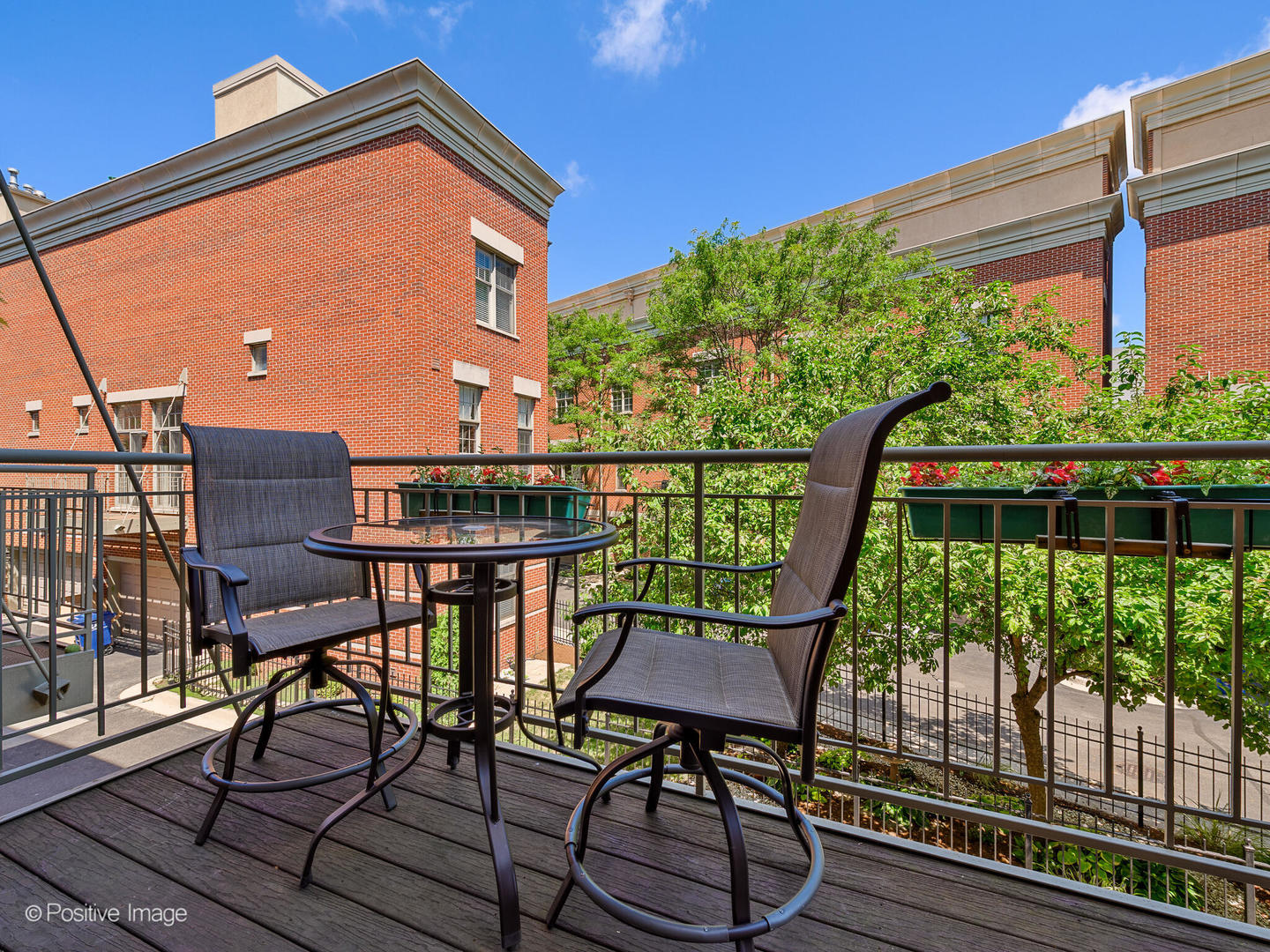 855 North May Street, Unit E Chicago, IL 60642 - Photo 12 of 30 a balcony view with couple of chairs