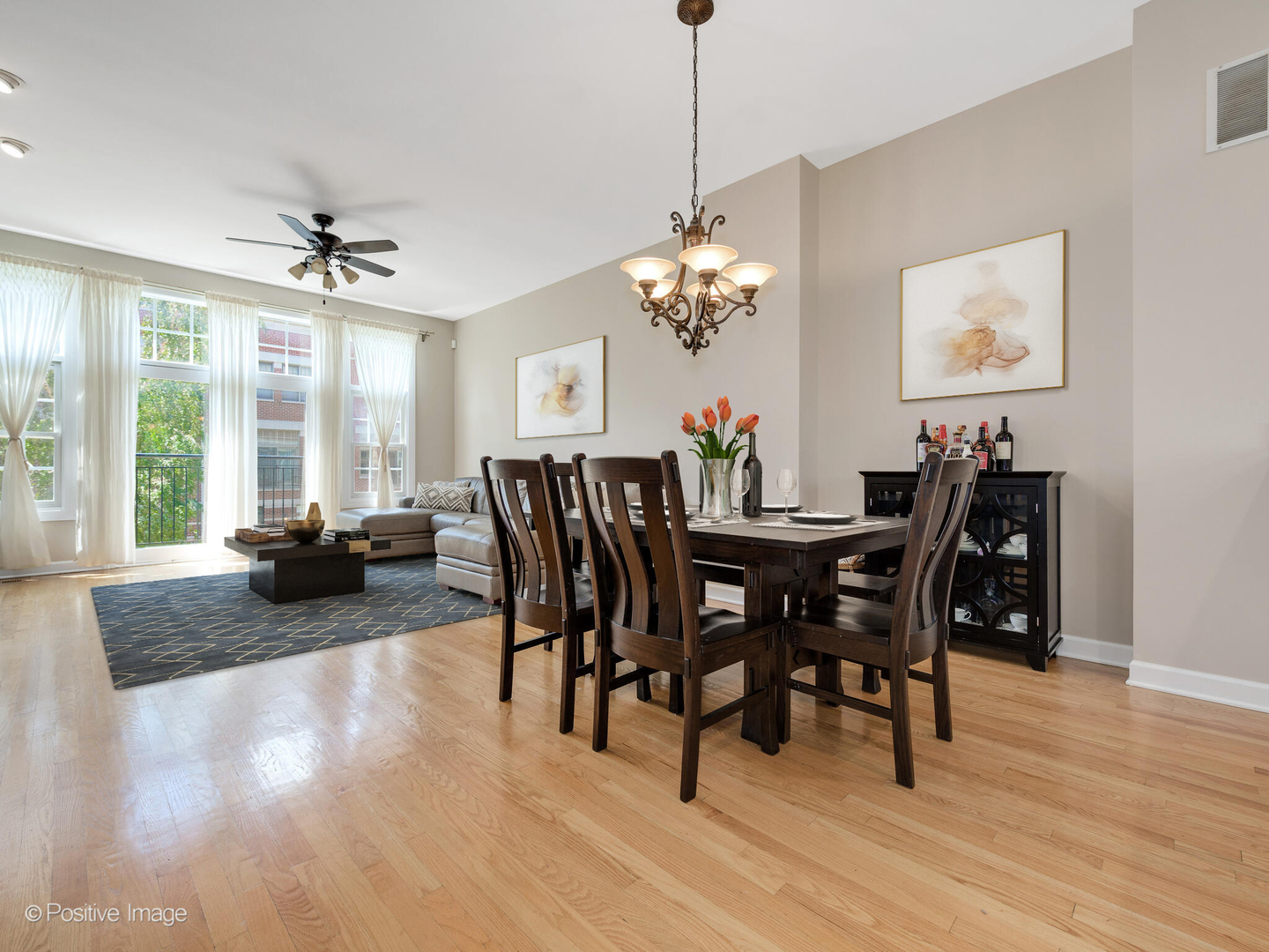 855 North May Street, Unit E Chicago, IL 60642 - Photo 6 of 30 a view of a dining room with furniture window and wooden floor