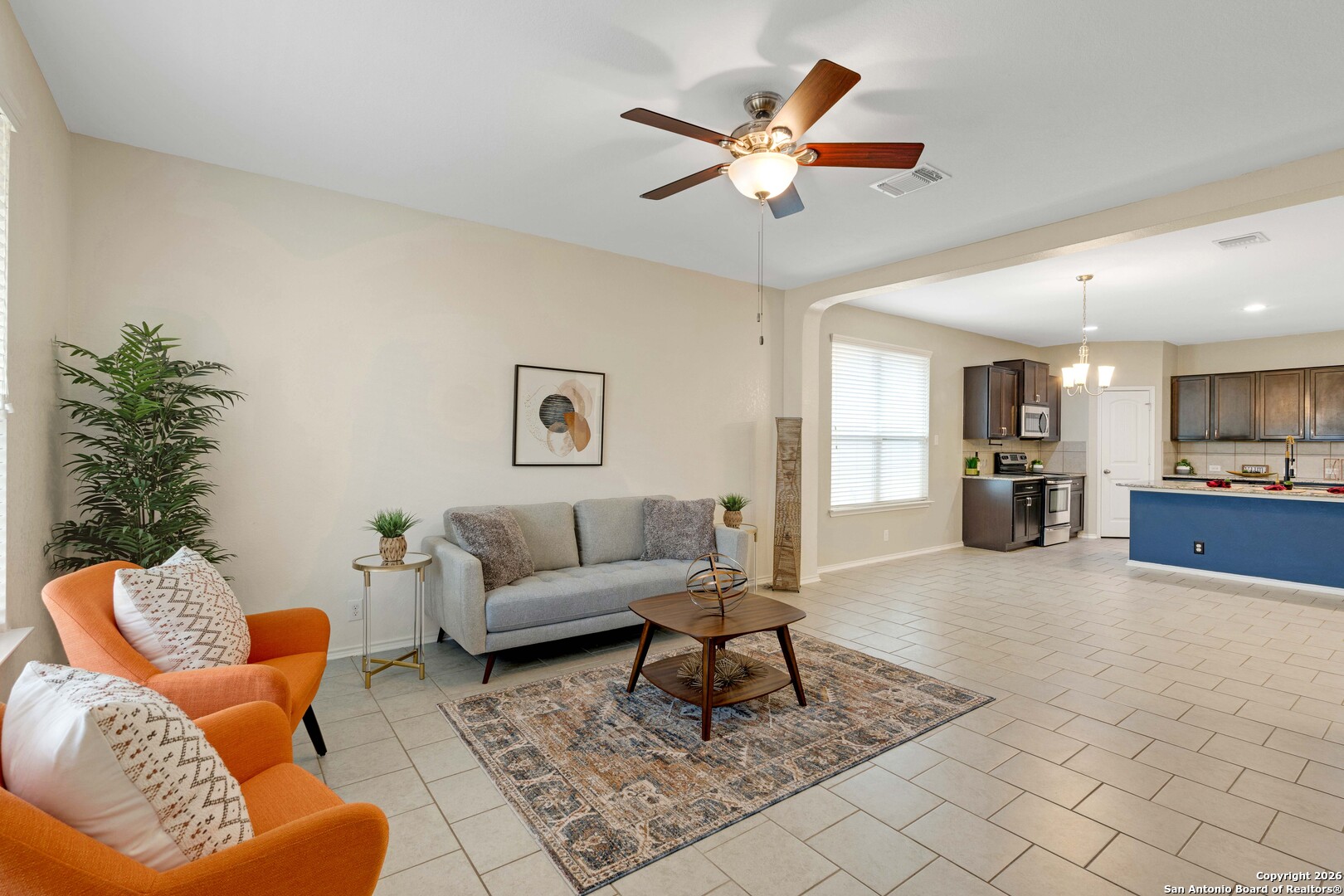 428 Kings Way Cibolo, TX 78108 - Photo 12 of 30 a living room with furniture and kitchen view