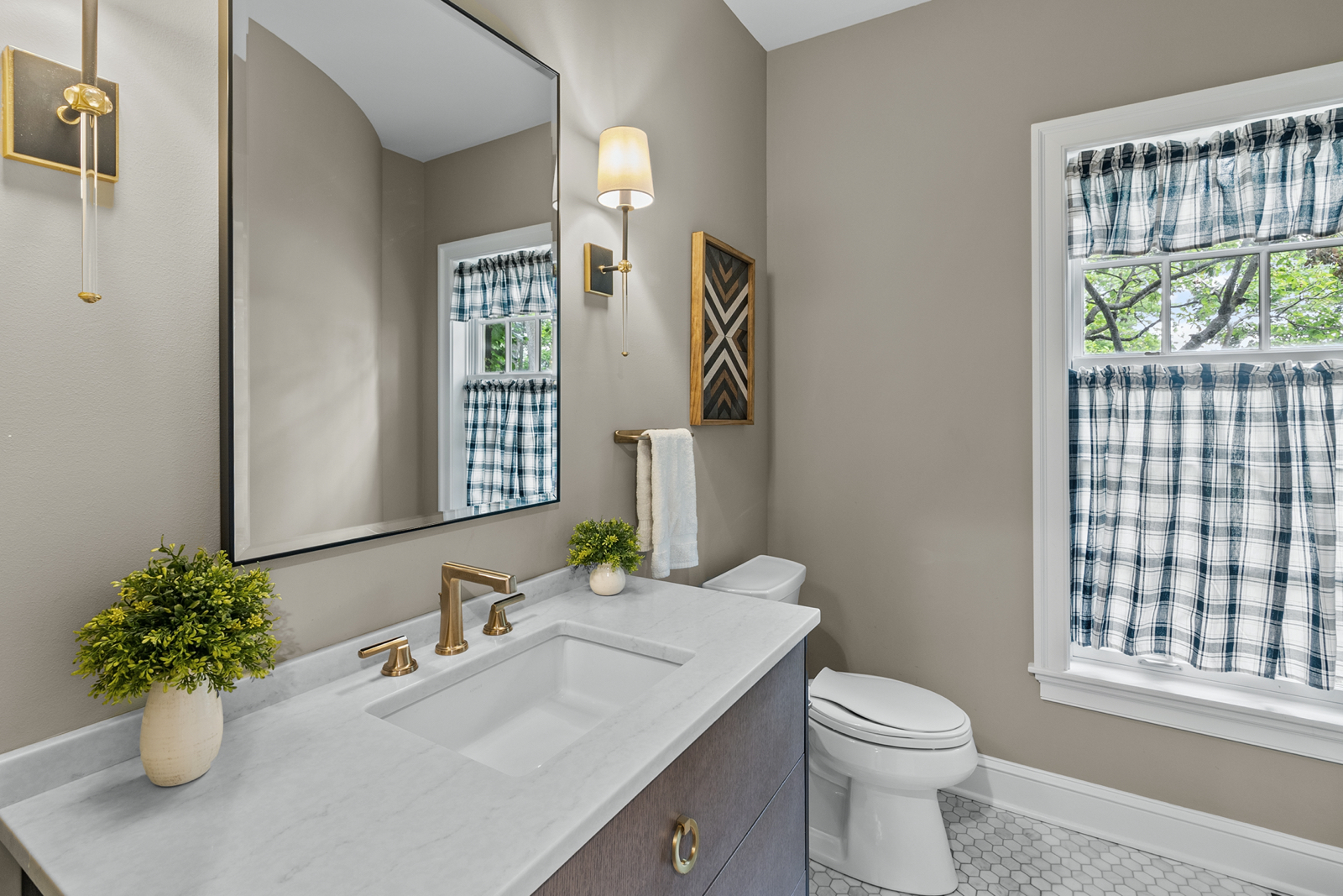 7208 White Oaks Road Harvard, IL 60033 - Photo 21 of 48 a bathroom with a sink toilet and a mirror