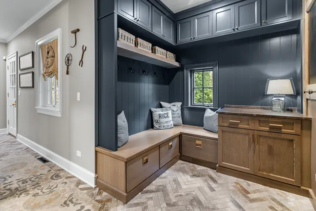 a kitchen with stainless steel appliances granite countertop a refrigerator and a stove