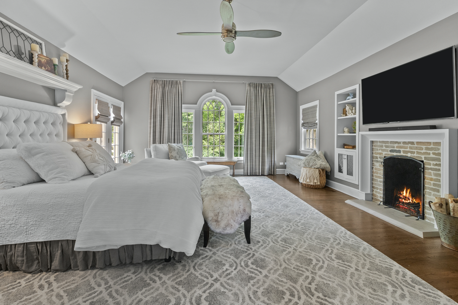 7208 White Oaks Road Harvard, IL 60033 - Photo 24 of 48 a spacious bedroom with a bed and a flat screen tv