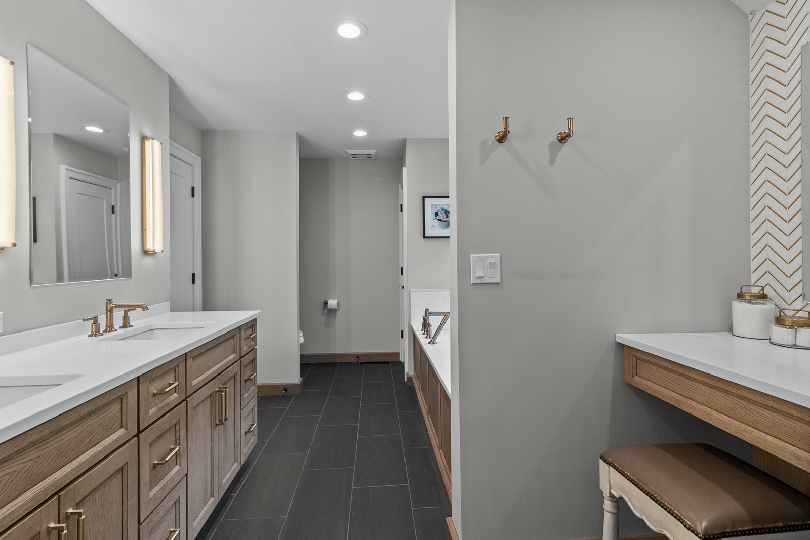 7208 White Oaks Road Harvard, IL 60033 - Photo 28 of 48 a bathroom with a double vanity sink and mirror