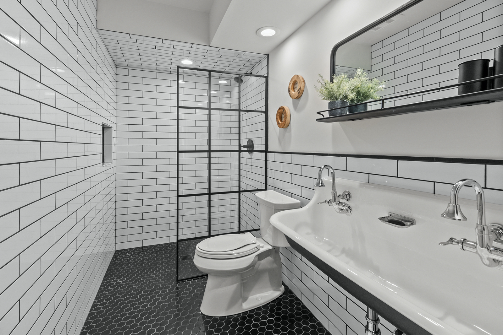 7208 White Oaks Road Harvard, IL 60033 - Photo 32 of 48 a bathroom with a sink toilet and shower