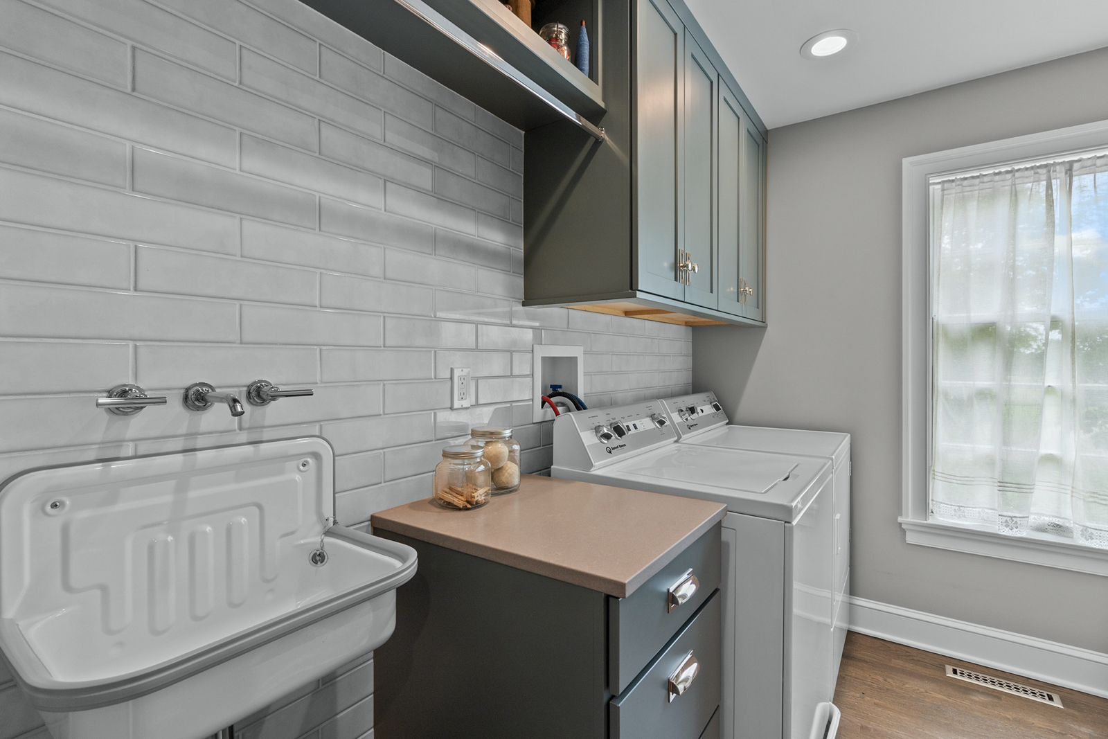 7208 White Oaks Road Harvard, IL 60033 - Photo 36 of 48 a utility room with cabinets washer and dryer
