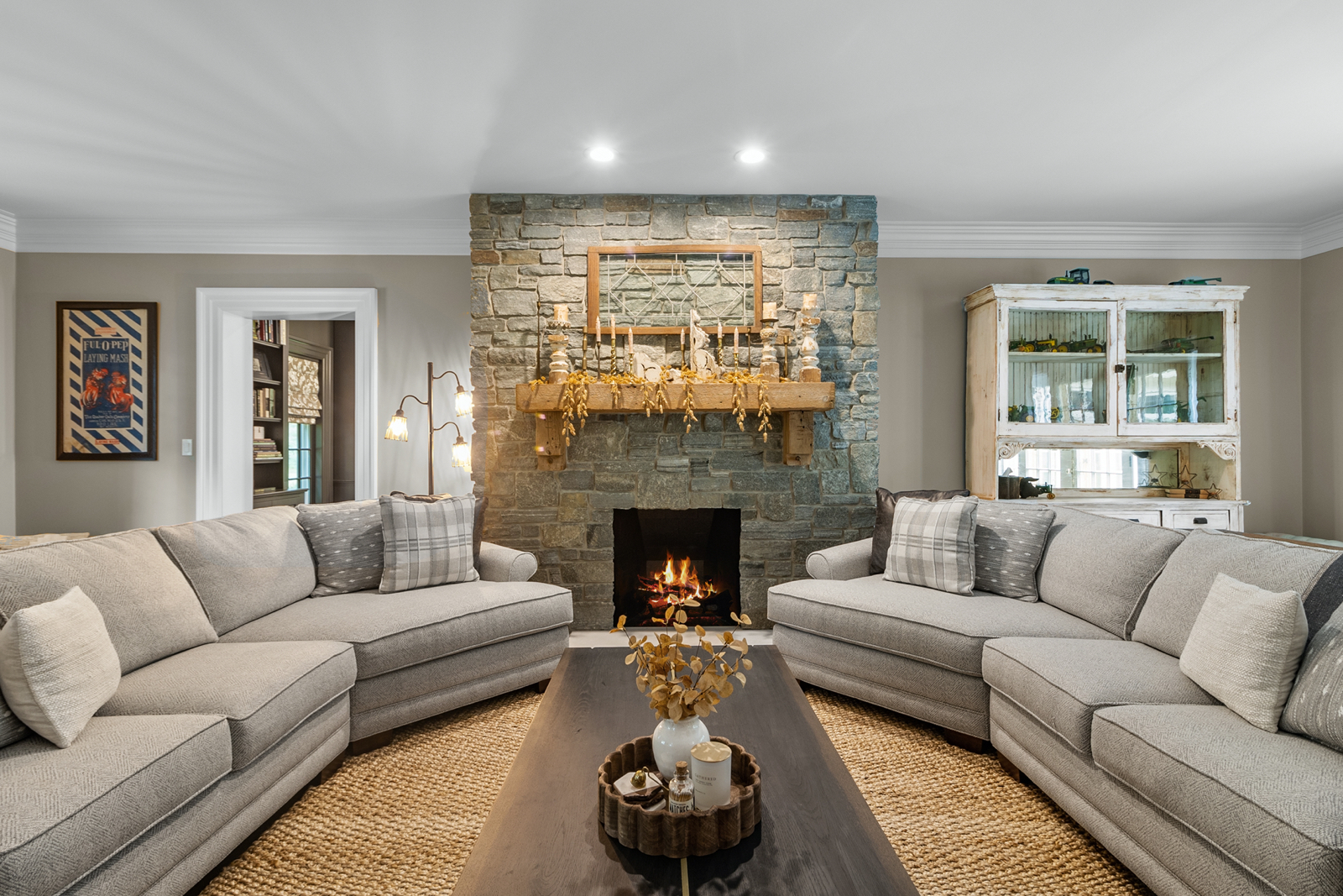 7208 White Oaks Road Harvard, IL 60033 - Photo 6 of 48 a living room with furniture and a fireplace