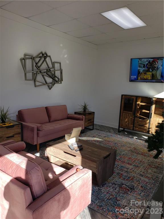 1323 Matthews-Mint Hill Road Matthews, NC 28105 - Photo 13 of 16 a living room with furniture and a couch