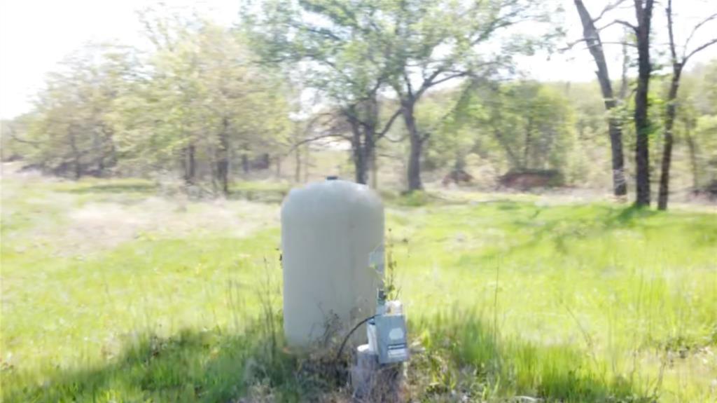 1031 Akin Road Poolville, TX 76487 - Photo 6 of 9 a view of a garden