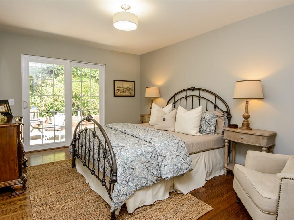 151 Eleanor Drive Woodside, CA 94062 - Photo 19 of 26 a bedroom with a bed and a large window