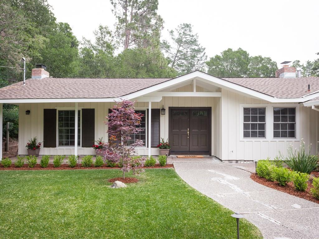 151 Eleanor Drive Woodside, CA 94062 - Photo 2 of 26 a front view of a house with garden and porch