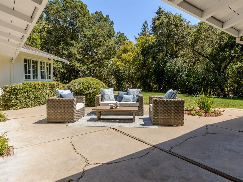 151 Eleanor Drive Woodside, CA 94062 - Photo 21 of 26 a view of a terrace with a bench