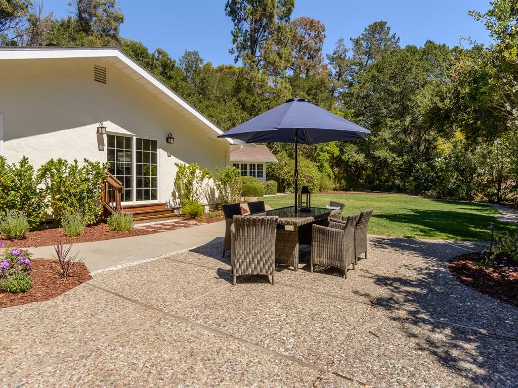 151 Eleanor Drive Woodside, CA 94062 - Photo 22 of 26 a view of a house with backyard and sitting area