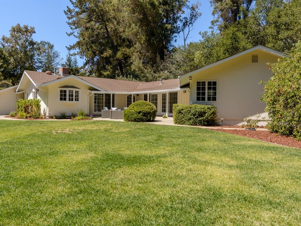 151 Eleanor Drive Woodside, CA 94062 - Photo 23 of 26 a front view of a house with a garden
