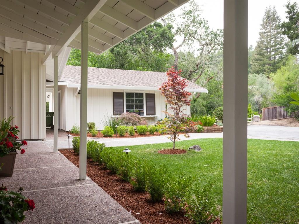 151 Eleanor Drive Woodside, CA 94062 - Photo 4 of 26 a front view of a house with garden