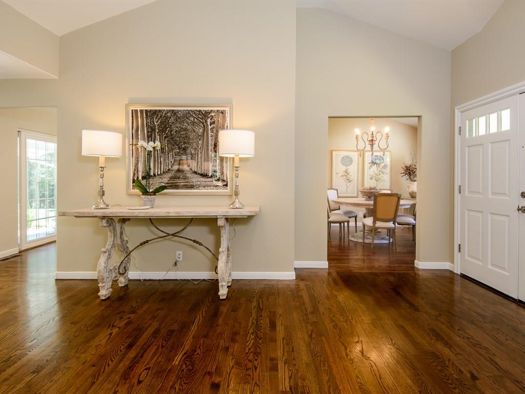 151 Eleanor Drive Woodside, CA 94062 - Photo 6 of 26 a view of a livingroom with furniture wooden floor a sink and windows