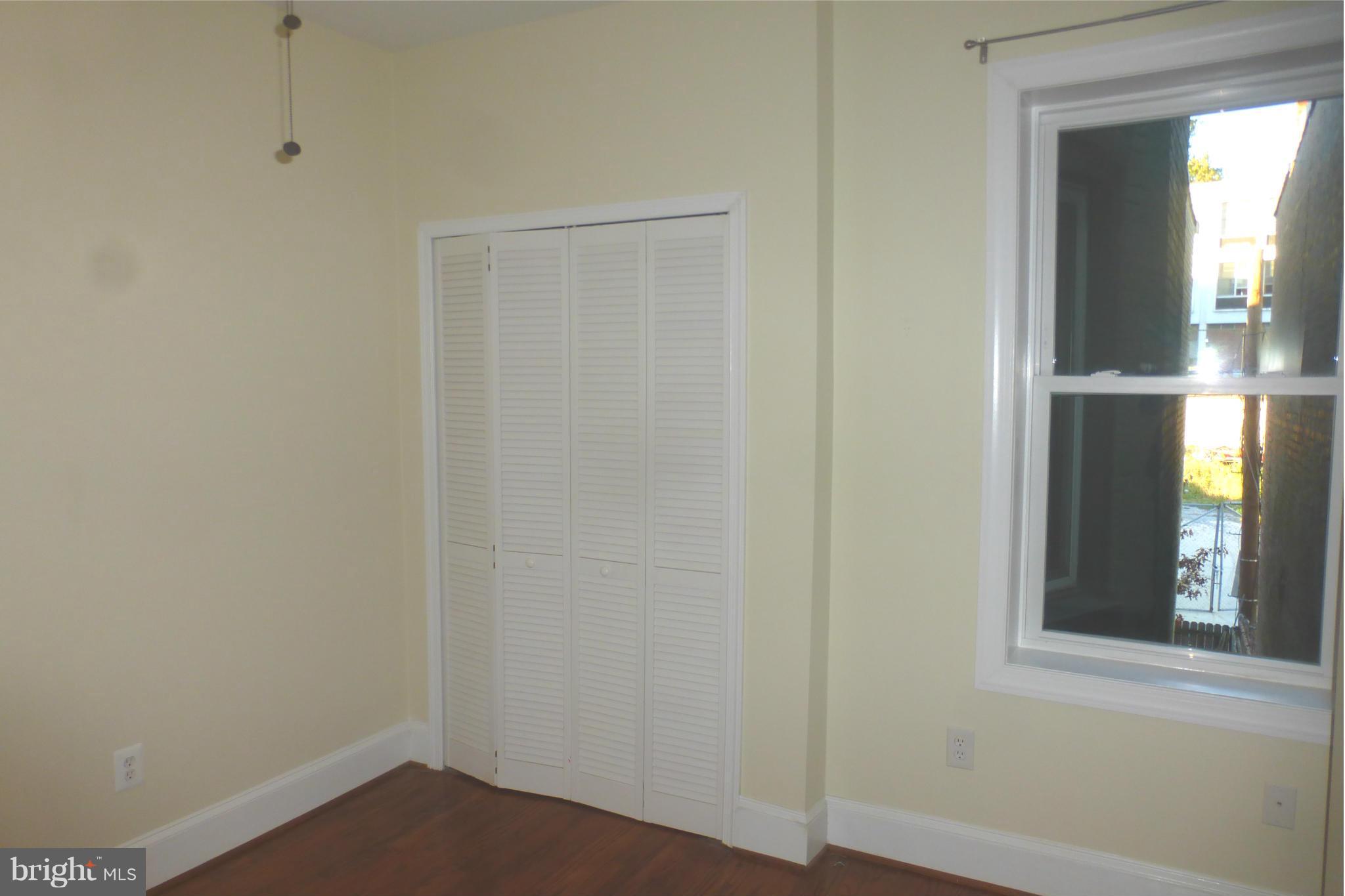 44 R Street Northeast Washington, DC 20002 - Photo 22 of 30 a small space with wooden floor and a window