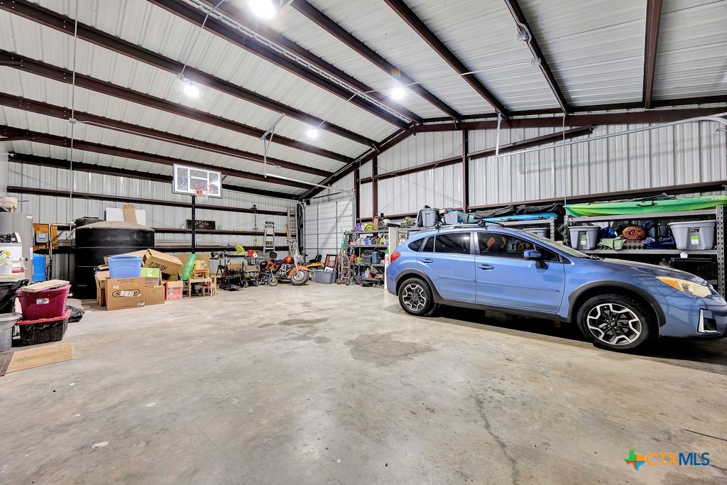 6887 Smith Dairy Road Belton, TX 76513 - Photo 35 of 48 a view of parking garage with cars