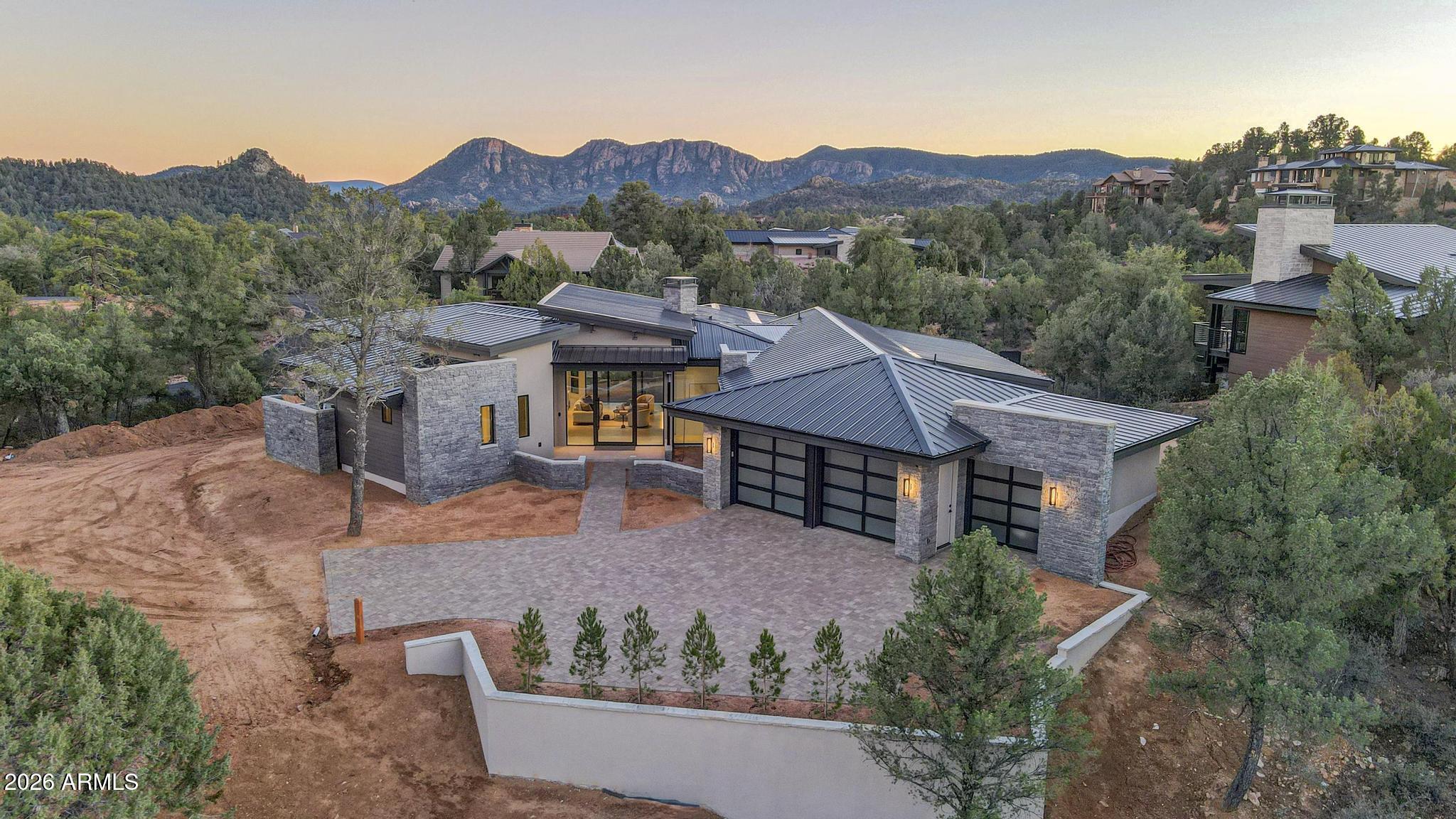 1002 South Dells Point Payson, AZ 85541 - Photo 2 of 5 a view of a house with a mountain in the background