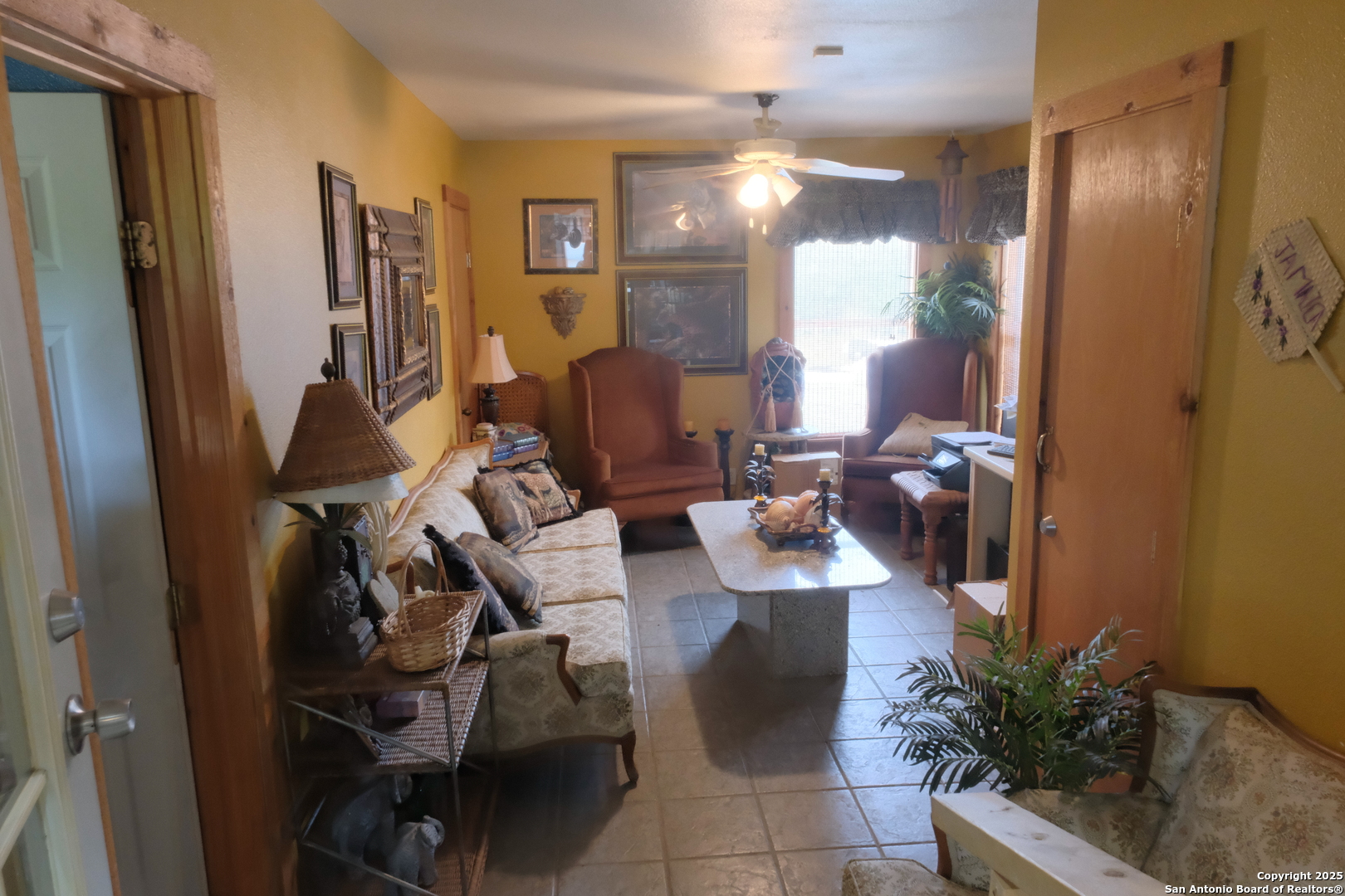17585 Fargoer Way Marion, TX 78124 - Photo 17 of 34 a view of a livingroom with furniture and a window